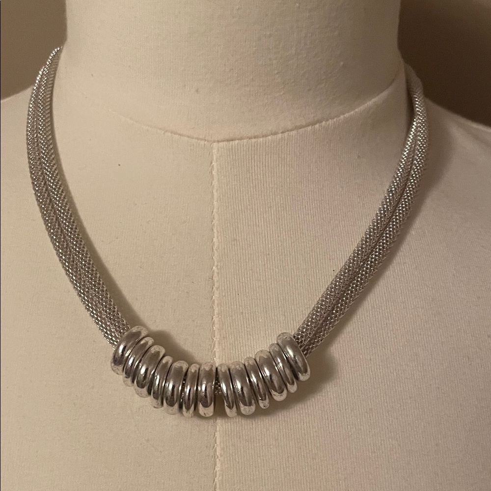 Elegant Silver Necklace with Ring Accents